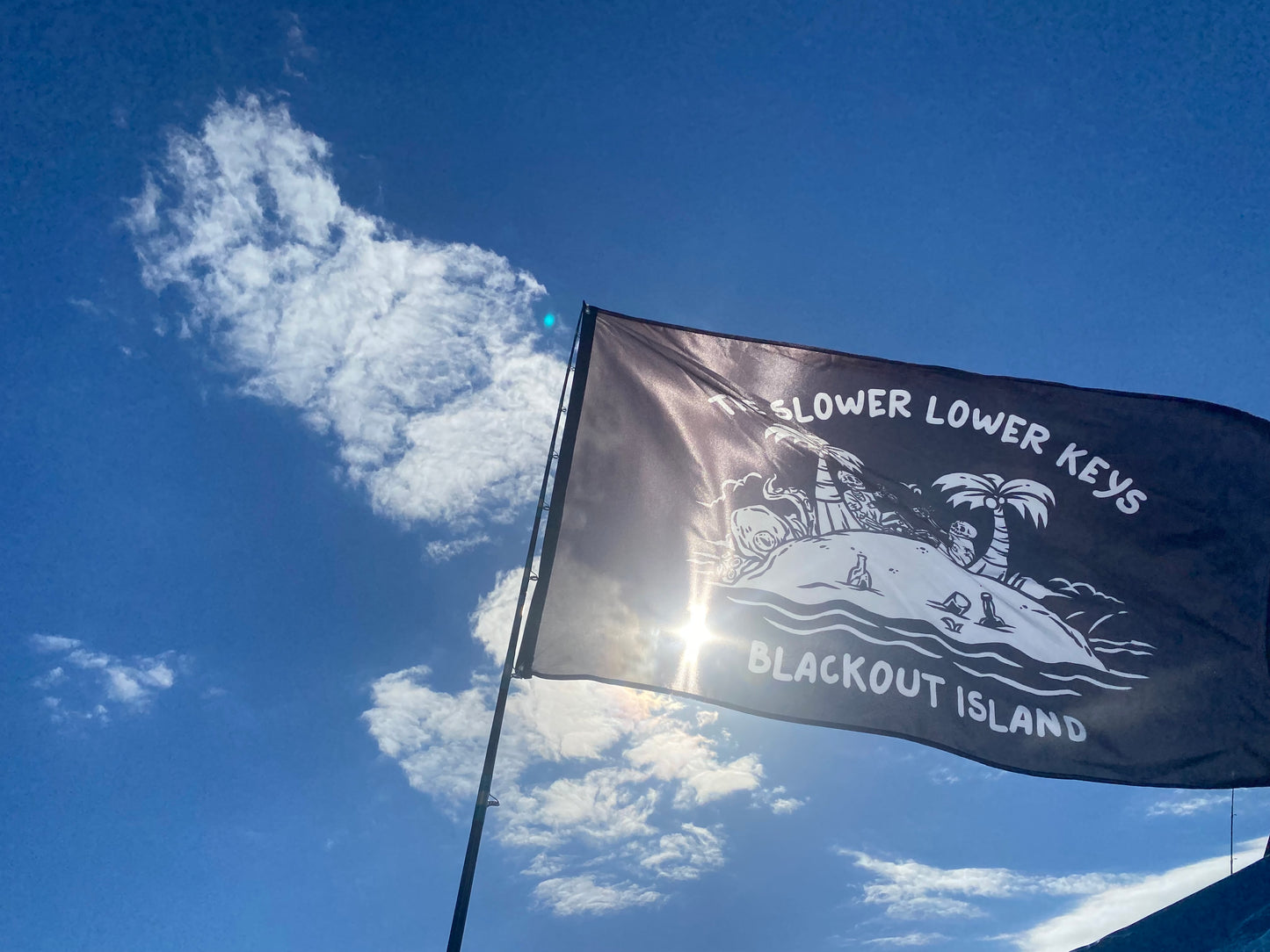 The Slower Lower Keys Blackout Island Boat Flag
